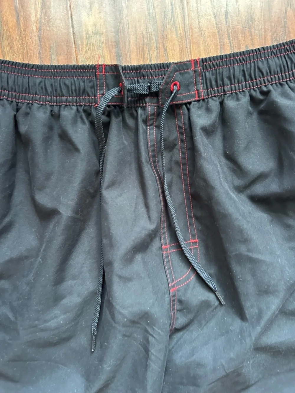 TYR Black Swim Shorts with Red Stitching